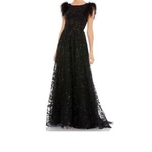Mac Duggal black gown size 18 worn once for 5 hrs. Great condition.